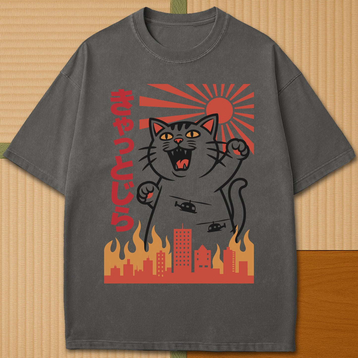 Japanese-inspired cotton Catzilla Rising Sun T-Shirt in Pepper on Comfort Colors 1717, styled in a modern flatlay scene.
