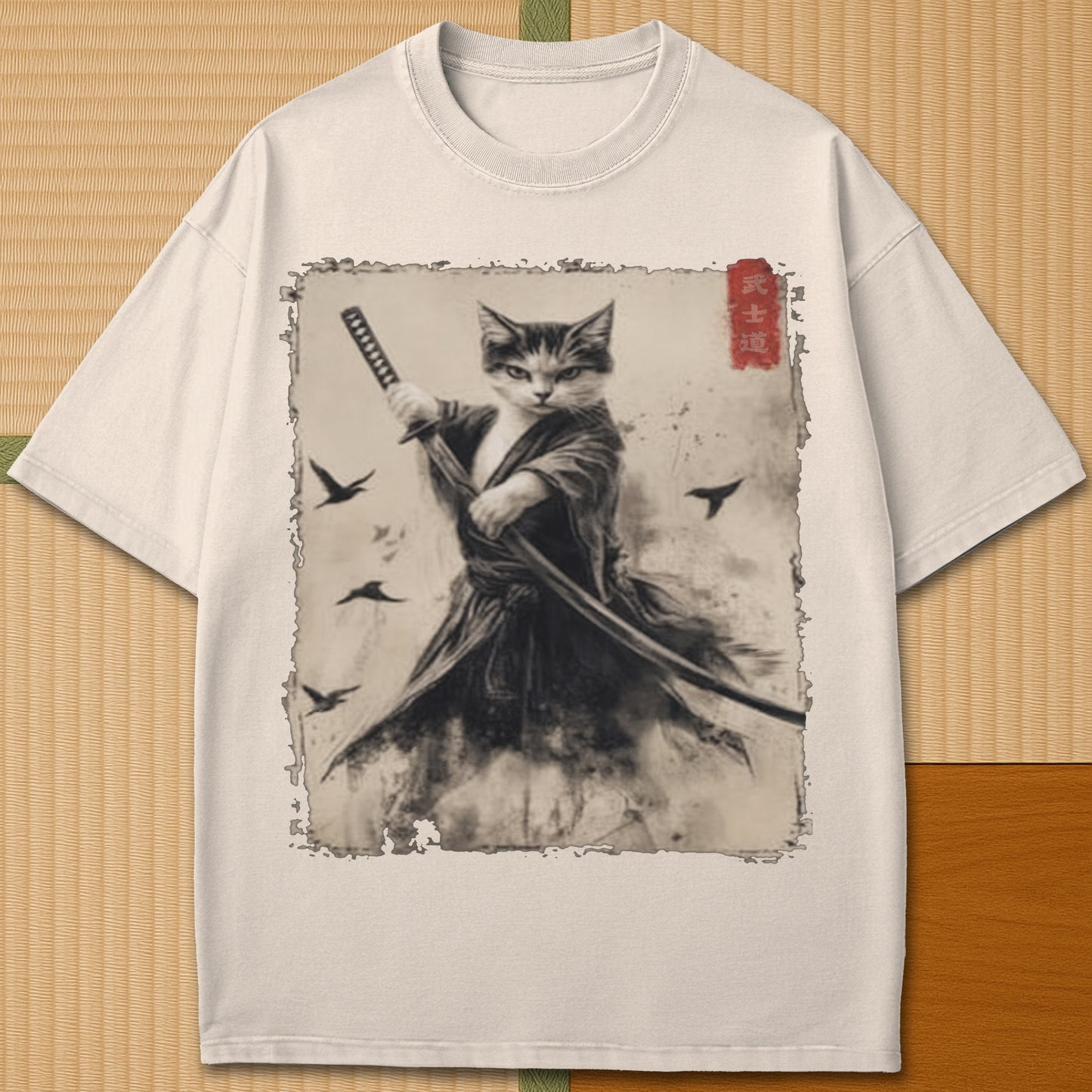 Japanese-inspired cotton Cat Samurai T-Shirt in Ivory on Comfort Colors 1717, styled in a modern flatlay scene.
