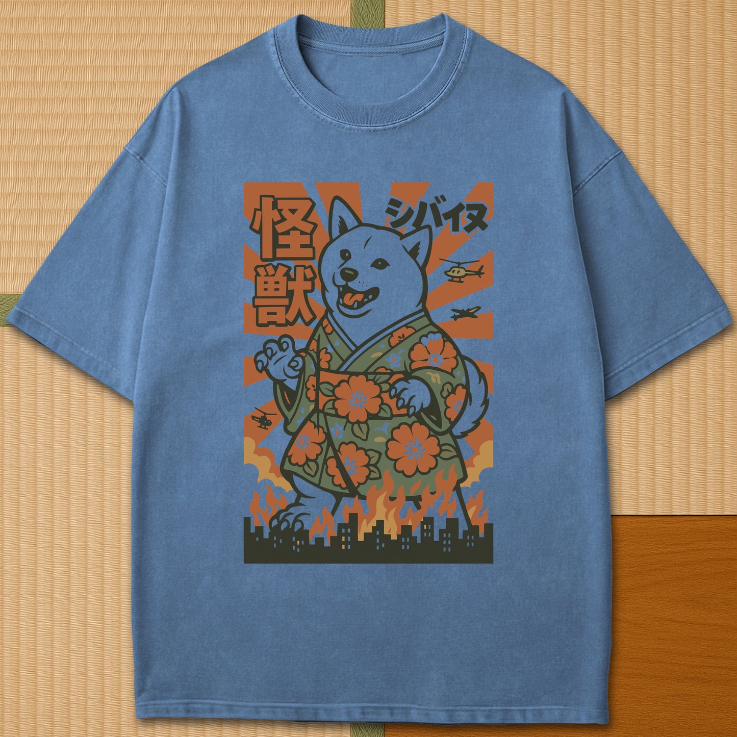Japanese-inspired cotton Kimono Kaiju Shiba T-Shirt in Blue Jean on Comfort Colors 1717, styled in a modern flatlay scene.