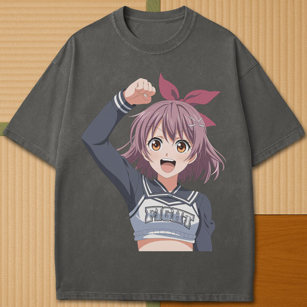 Japanese-inspired cotton Anime Cheerleader T-Shirt in Pepper on Comfort Colors 1717, styled in a modern flatlay scene.