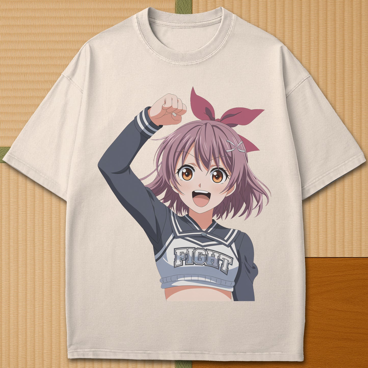 Japanese-inspired cotton Anime Cheerleader T-Shirt in Ivory on Comfort Colors 1717, styled in a modern flatlay scene.