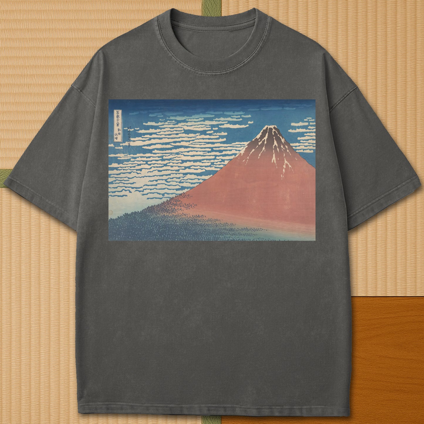 Japanese-inspired cotton Red Fuji By Hokusai T-Shirt in Pepper on Comfort Colors 1717, styled in a modern flatlay scene.