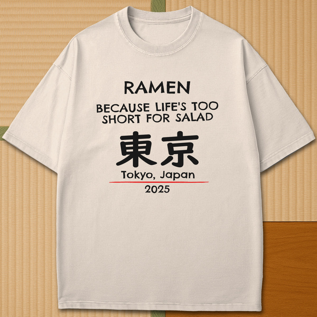 Japanese-inspired cotton Ramen Tokyo T-Shirt in Ivory on Comfort Colors 1717, styled in a modern flatlay scene.