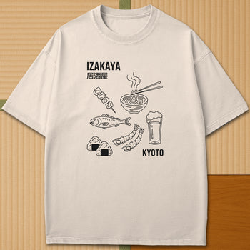 Japanese-inspired cotton Izakaya Japanese Foodie T-Shirt in Ivory on Comfort Colors 1717, styled in a modern flatlay scene.