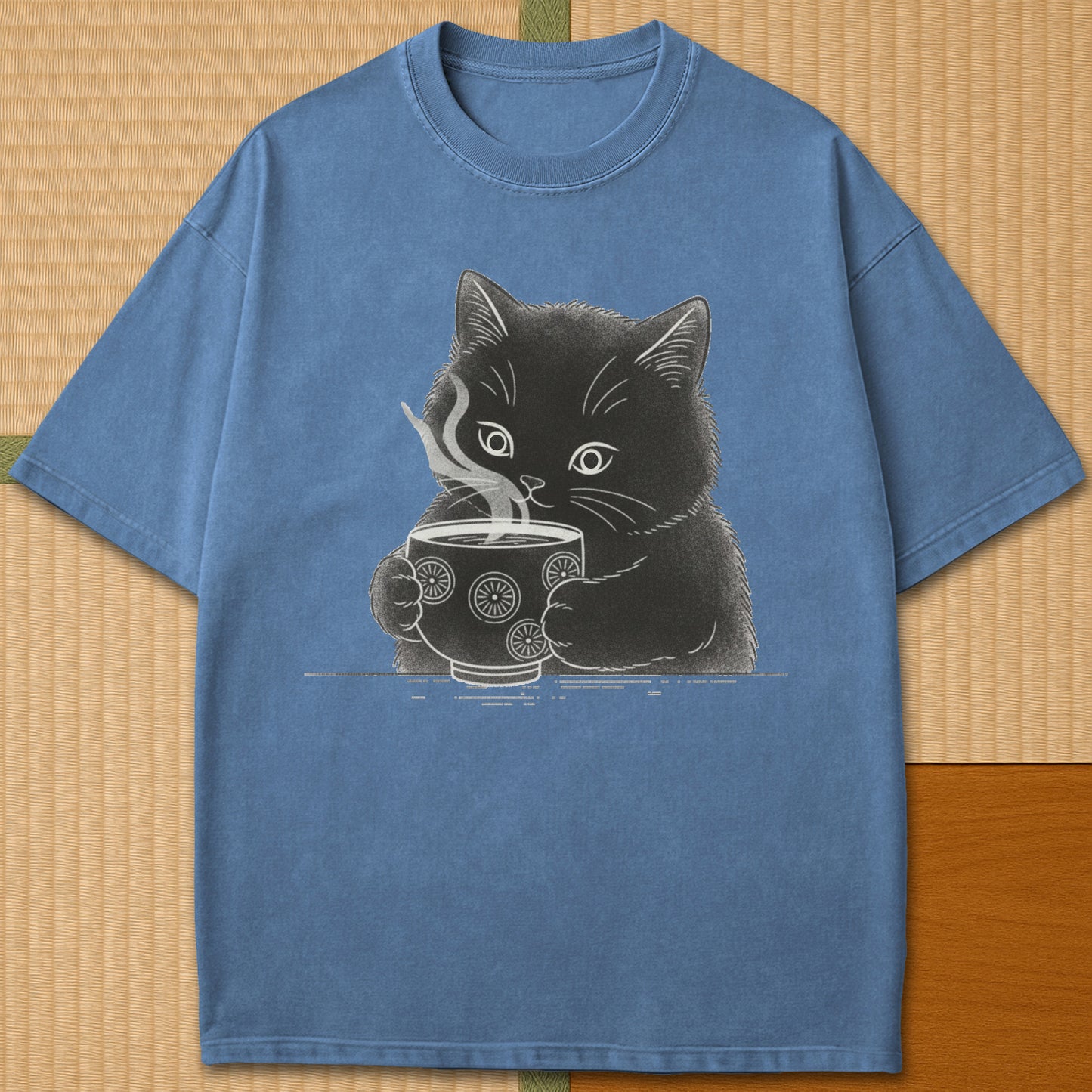 Japanese-inspired cotton Kitten Paws Tea Time T-Shirt in Blue Jean on Comfort Colors 1717, styled in a modern flatlay scene.