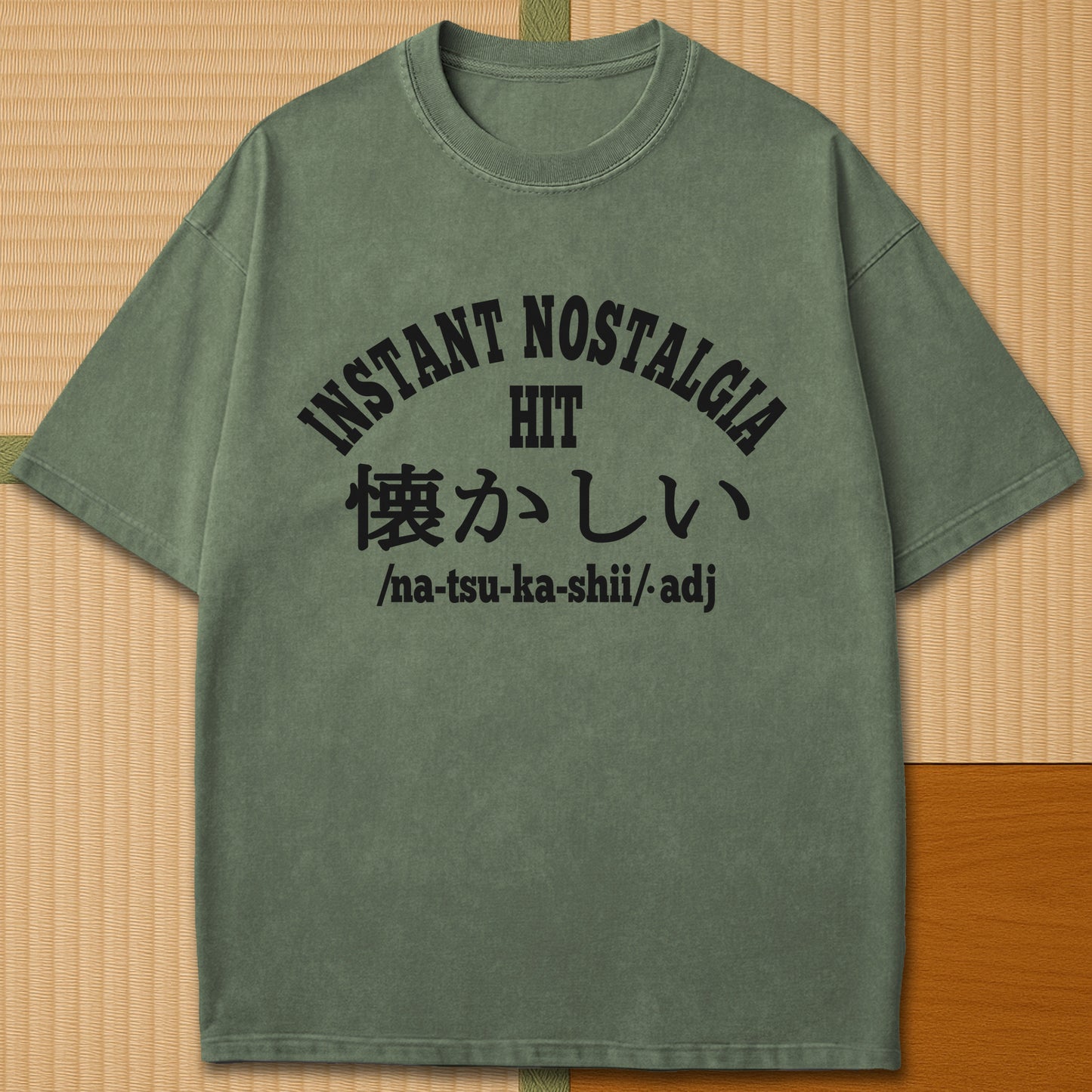 Japanese-inspired cotton Instant Nostalgia Hit T-Shirt in Moss on Comfort Colors 1717, styled in a modern flatlay scene.