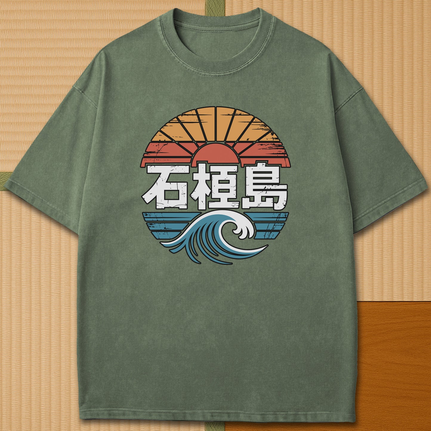 Japanese-inspired cotton Ishigaki Island Vintage Graphic Travel T-Shirt in Moss on Comfort Colors 1717, styled in a modern flatlay scene.