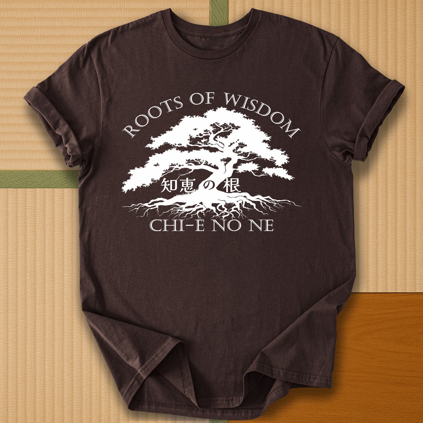 Japanese-inspired cotton Roots of Wisdom T-Shirt in Dark Chocolate on Gildan 64000, styled in a modern flatlay scene