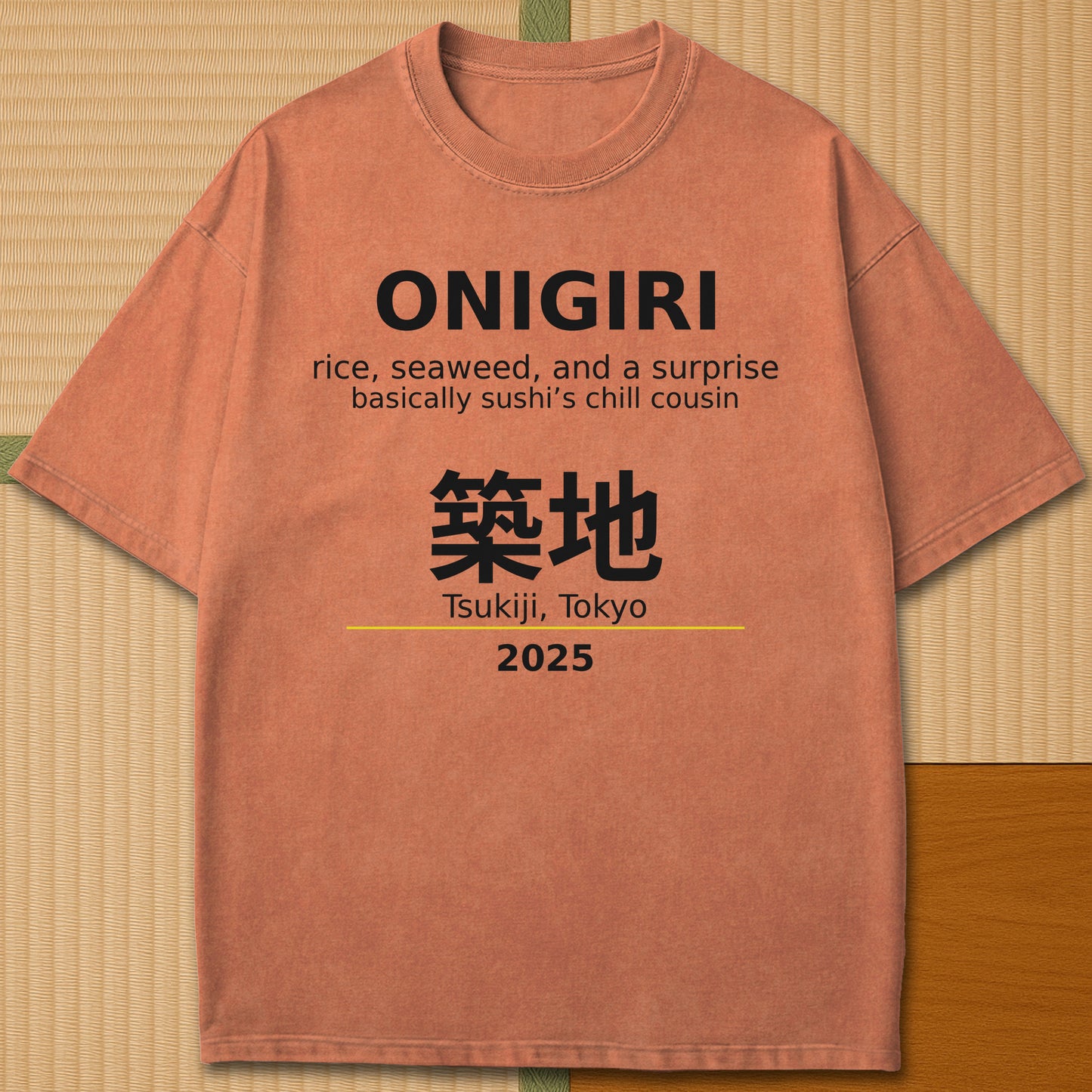 Japanese-inspired cotton Onigiri Tsukiji T-Shirt in Yam on Comfort Colors 1717, styled in a modern flatlay scene.
