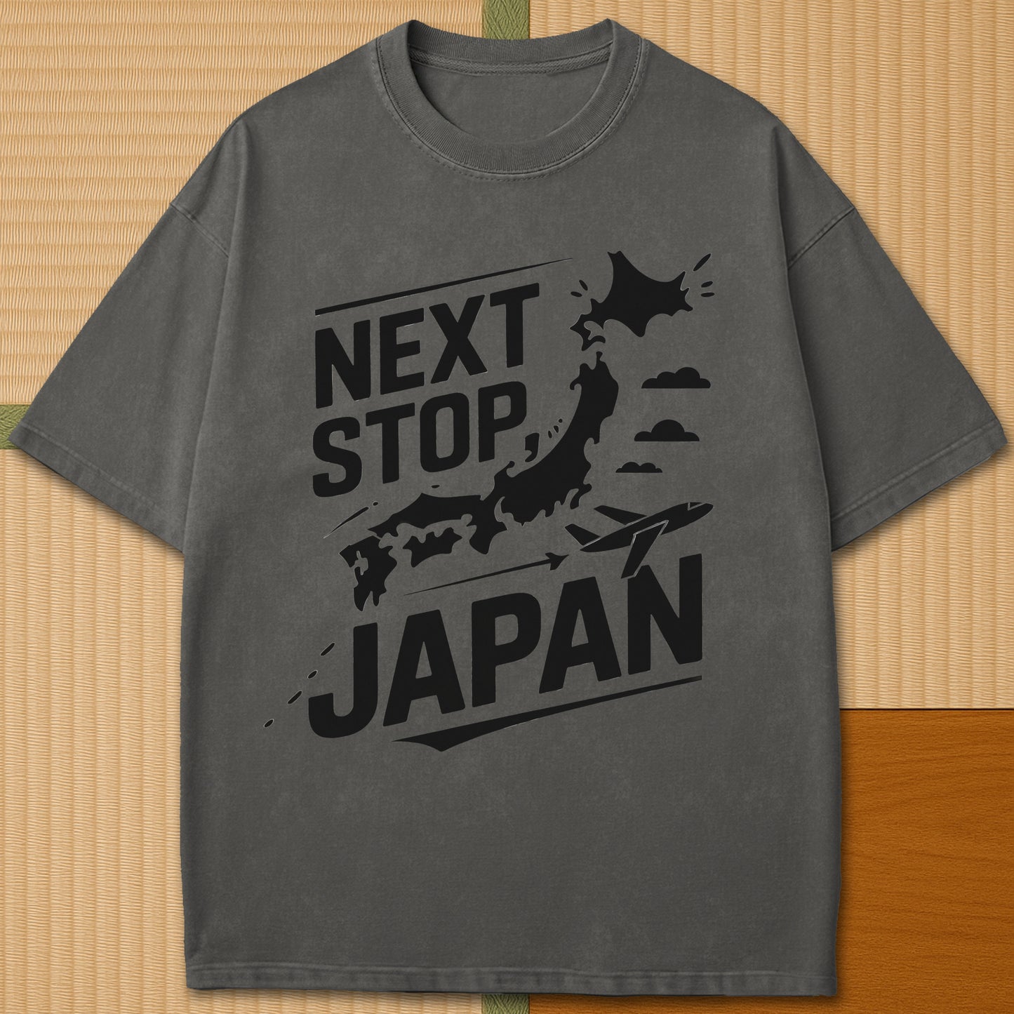 Japanese-inspired cotton Next Stop Japan T-Shirt in Pepper on Comfort Colors 1717, styled in a modern flatlay scene.