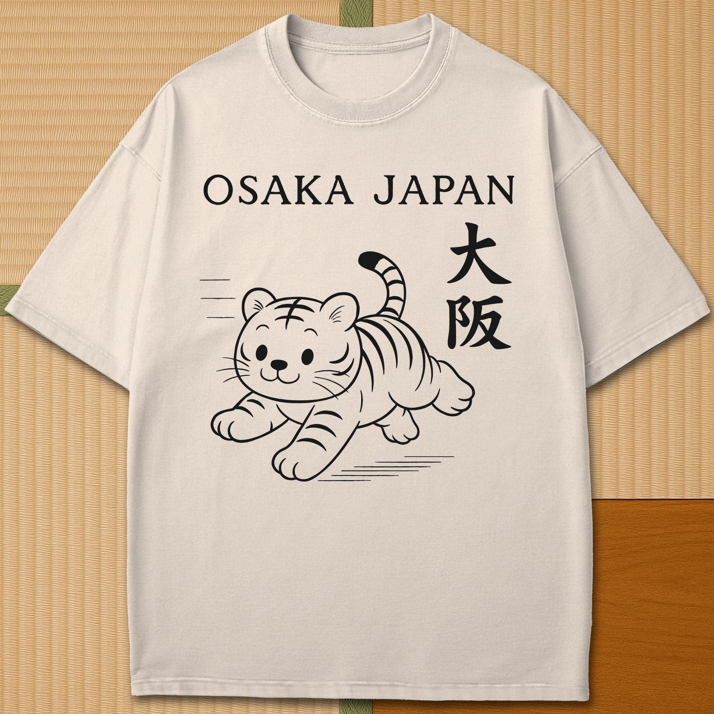 Japanese-inspired cotton Osaka Tiger T-Shirt in Ivory on Comfort Colors 1717, styled in a modern flatlay scene.