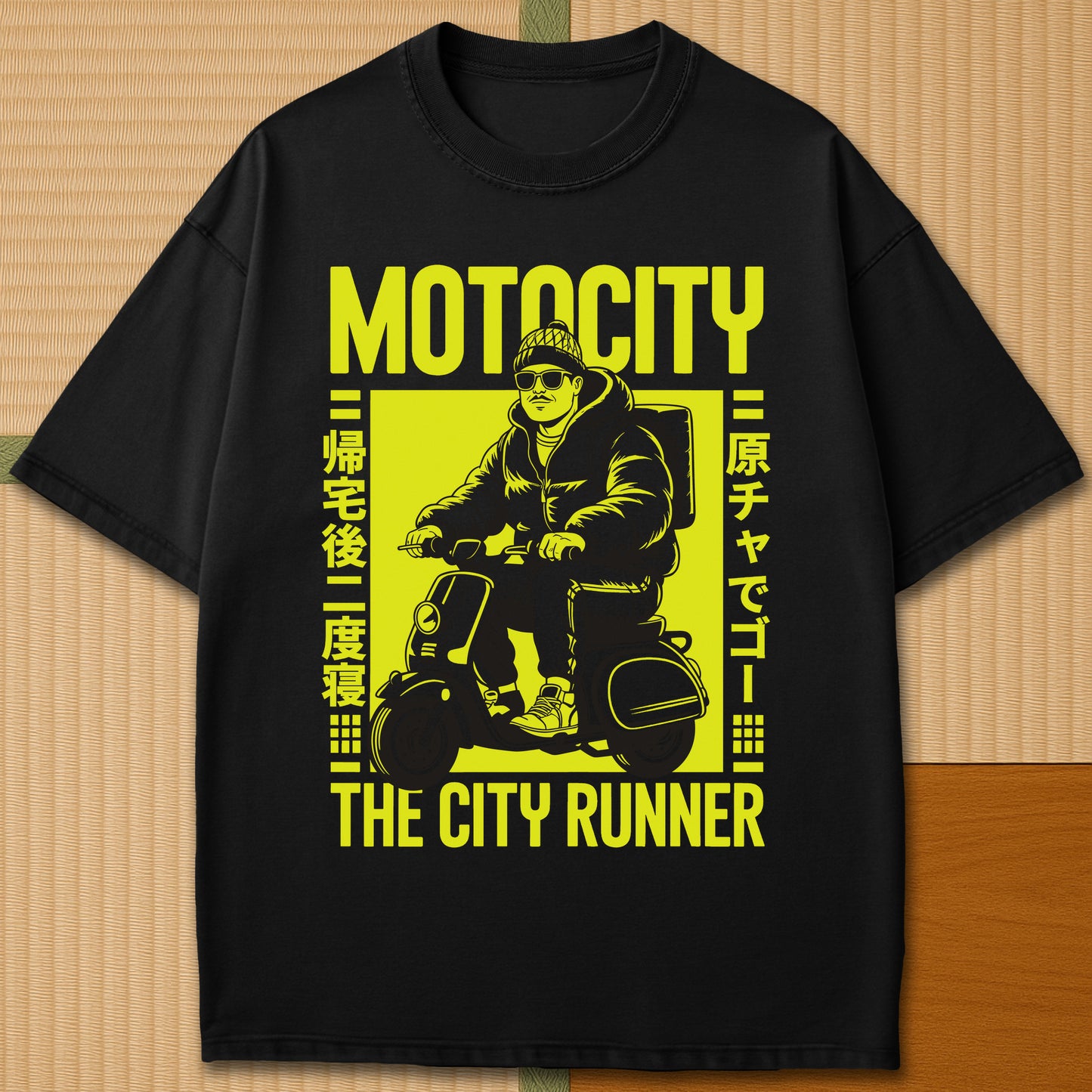 Japanese-inspired cotton Motocity The City Runner T-Shirt in Black on Comfort Colors 1717, styled in a modern flatlay scene.