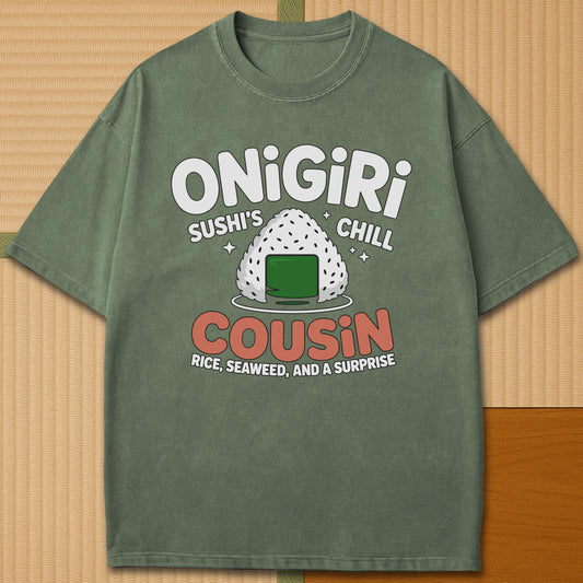 Japanese-inspired cotton Sushis Chill Cousin Onigiri T-Shirt in Moss on Comfort Colors 1717, styled in a modern flatlay scene.