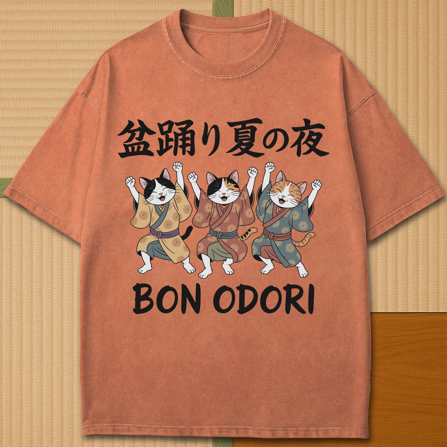 Japanese-inspired cotton Summer Night Bon Odori Cats T-Shirt in Yam on Comfort Colors 1717, styled in a modern flatlay scene.