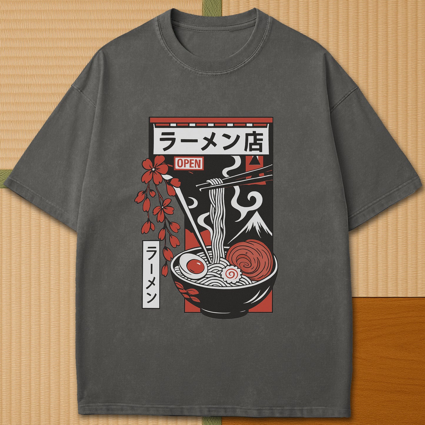 Japanese-inspired cotton Japanese Ramen Bowl T-Shirt in Pepper on Comfort Colors 1717, styled in a modern flatlay scene.
