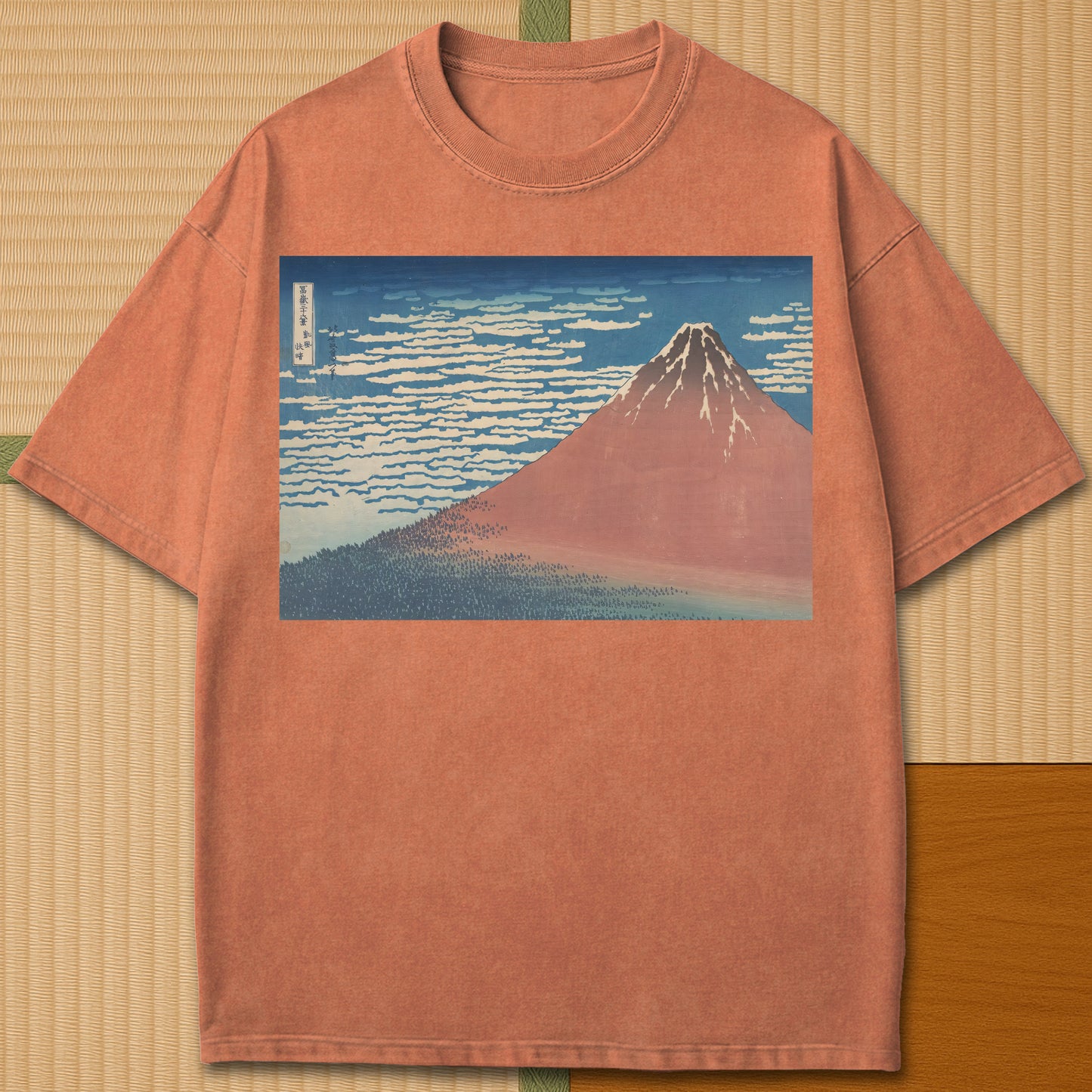 Japanese-inspired cotton Red Fuji By Hokusai T-Shirt in Yam on Comfort Colors 1717, styled in a modern flatlay scene.