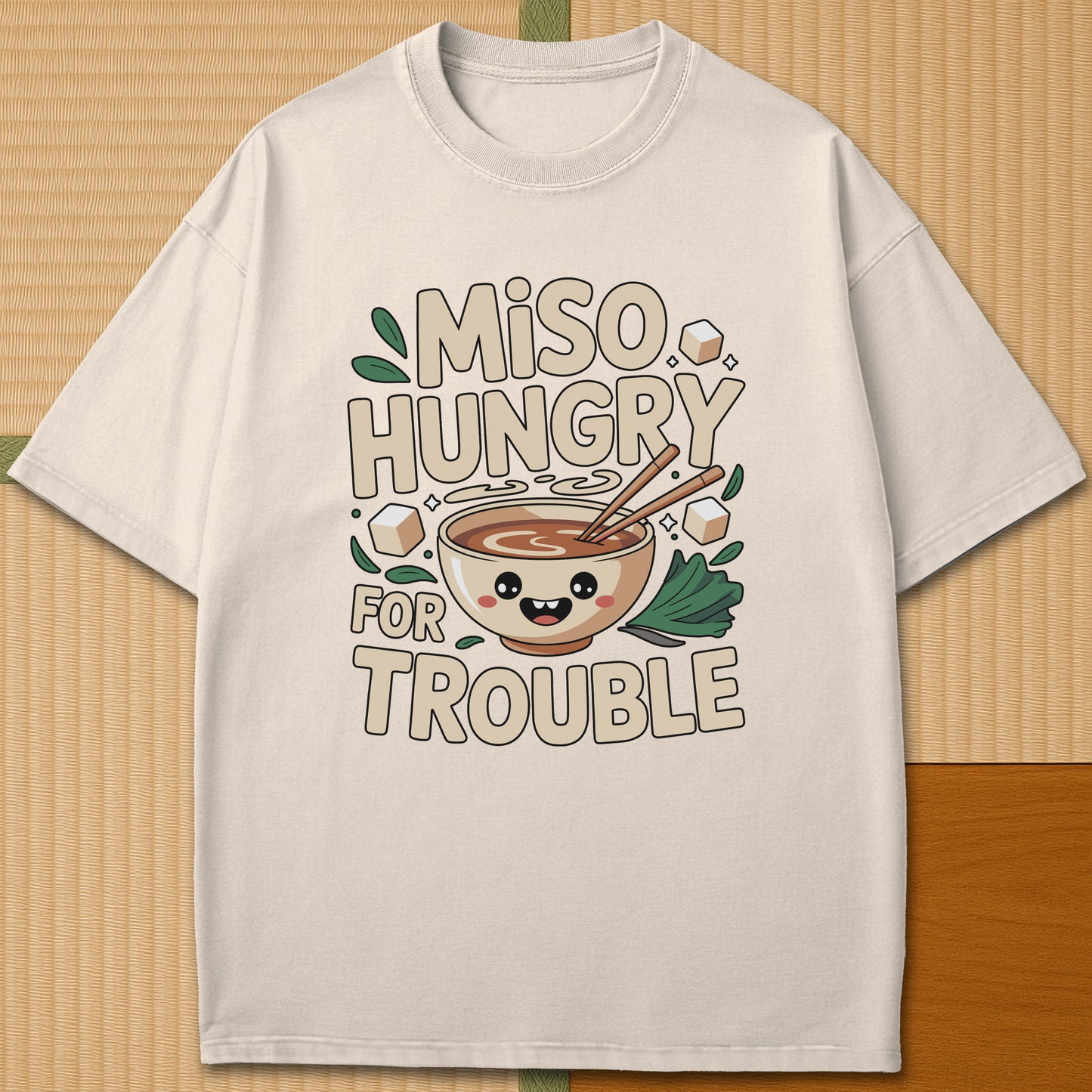 Japanese-inspired cotton Miso Hungry For Trouble Kawaii Soup T-Shirt in Ivory on Comfort Colors 1717, styled in a modern flatlay scene.