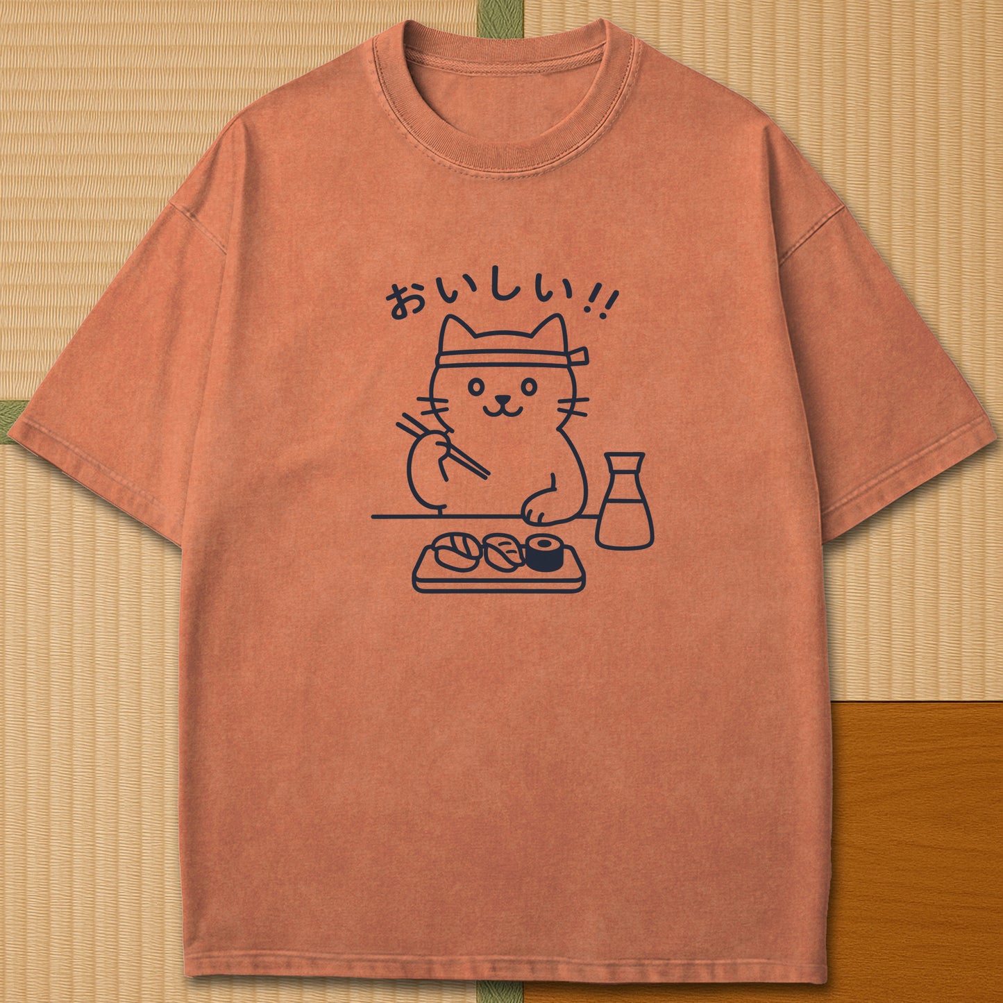 Japanese-inspired cotton Minimalist Cat & Sushi T-Shirt in Yam on Comfort Colors 1717, styled in a modern flatlay scene.