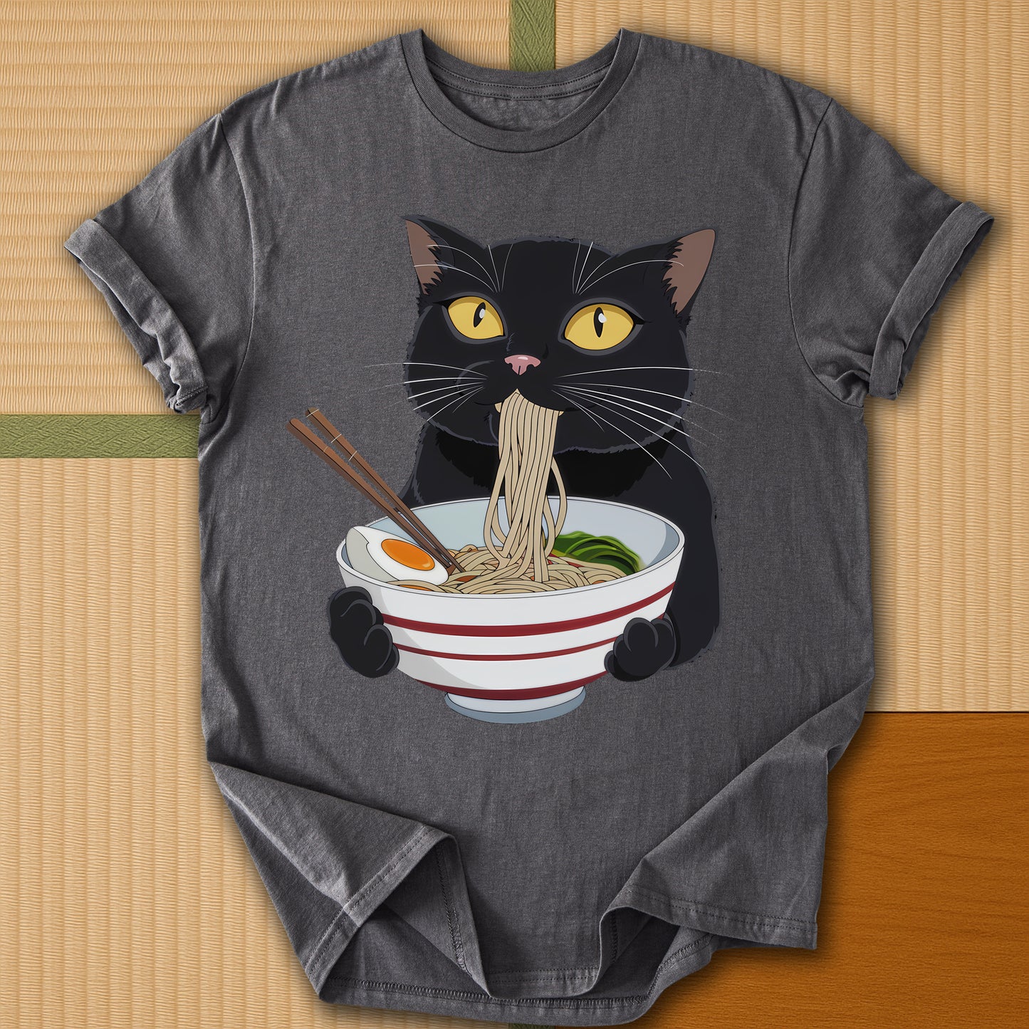 Japanese-inspired cotton Cat Eats Ramen T-Shirt in Charcoal on Gildan 64000, styled in a modern flatlay scene