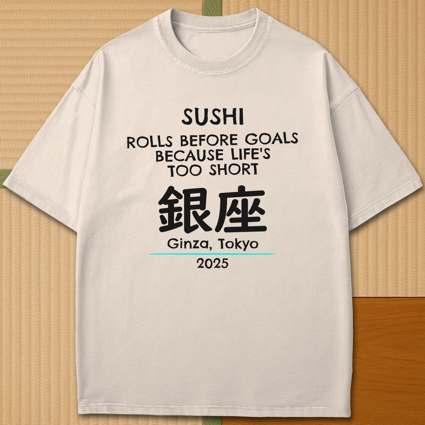 Japanese-inspired cotton Sushi Rolls Before Goals T-Shirt in Ivory on Comfort Colors 1717, styled in a modern flatlay scene.
