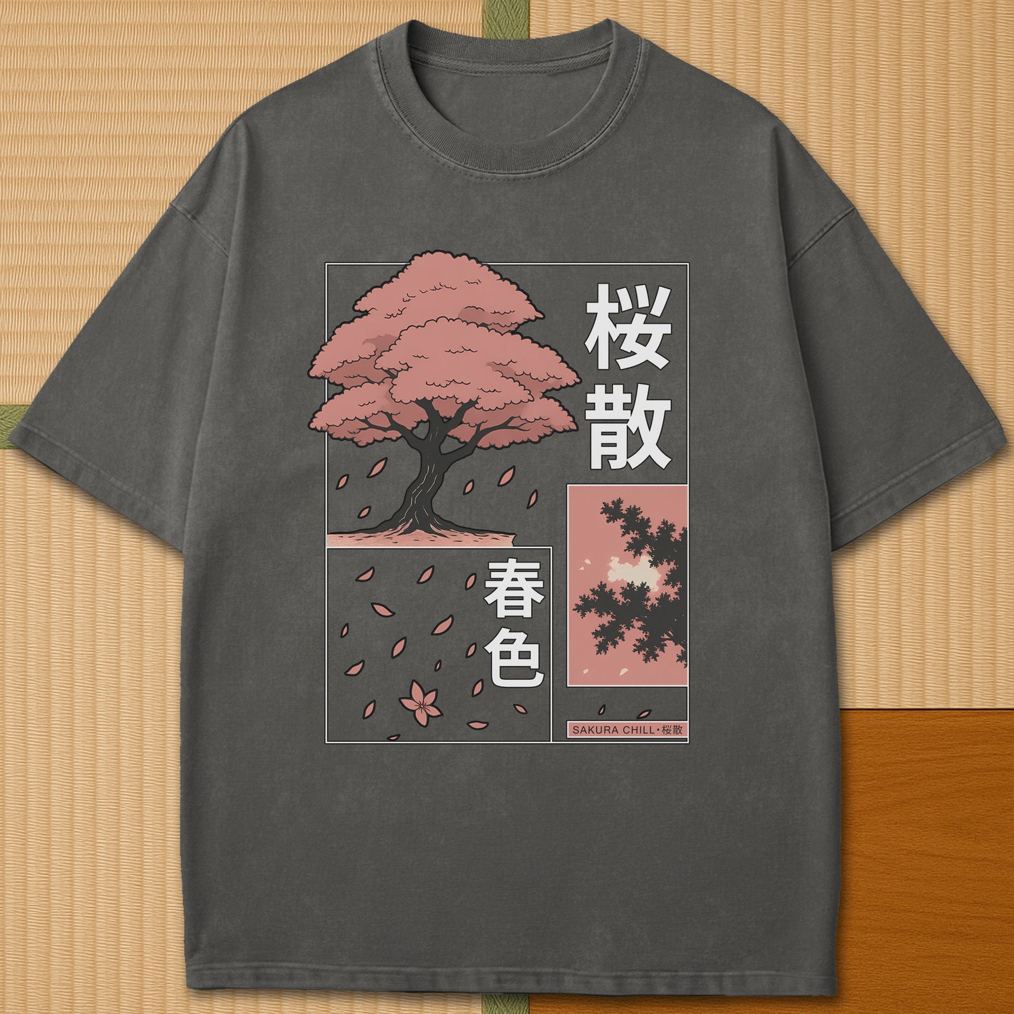 Japanese-inspired cotton Sakura Chill T-Shirt in Pepper on Comfort Colors 1717, styled in a modern flatlay scene.