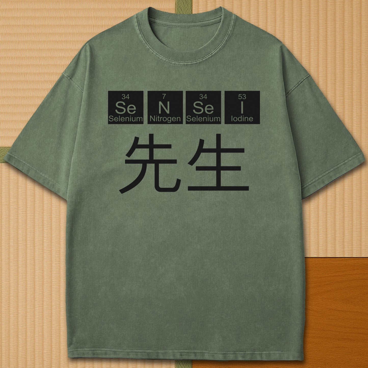Japanese-inspired cotton Sensei Periodic Table T-Shirt in Moss on Comfort Colors 1717, styled in a modern flatlay scene.