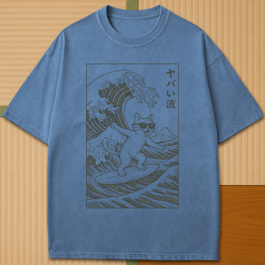 Japanese-inspired cotton Yabai Wave Cat T-Shirt in Blue Jean on Comfort Colors 1717, styled in a modern flatlay scene.