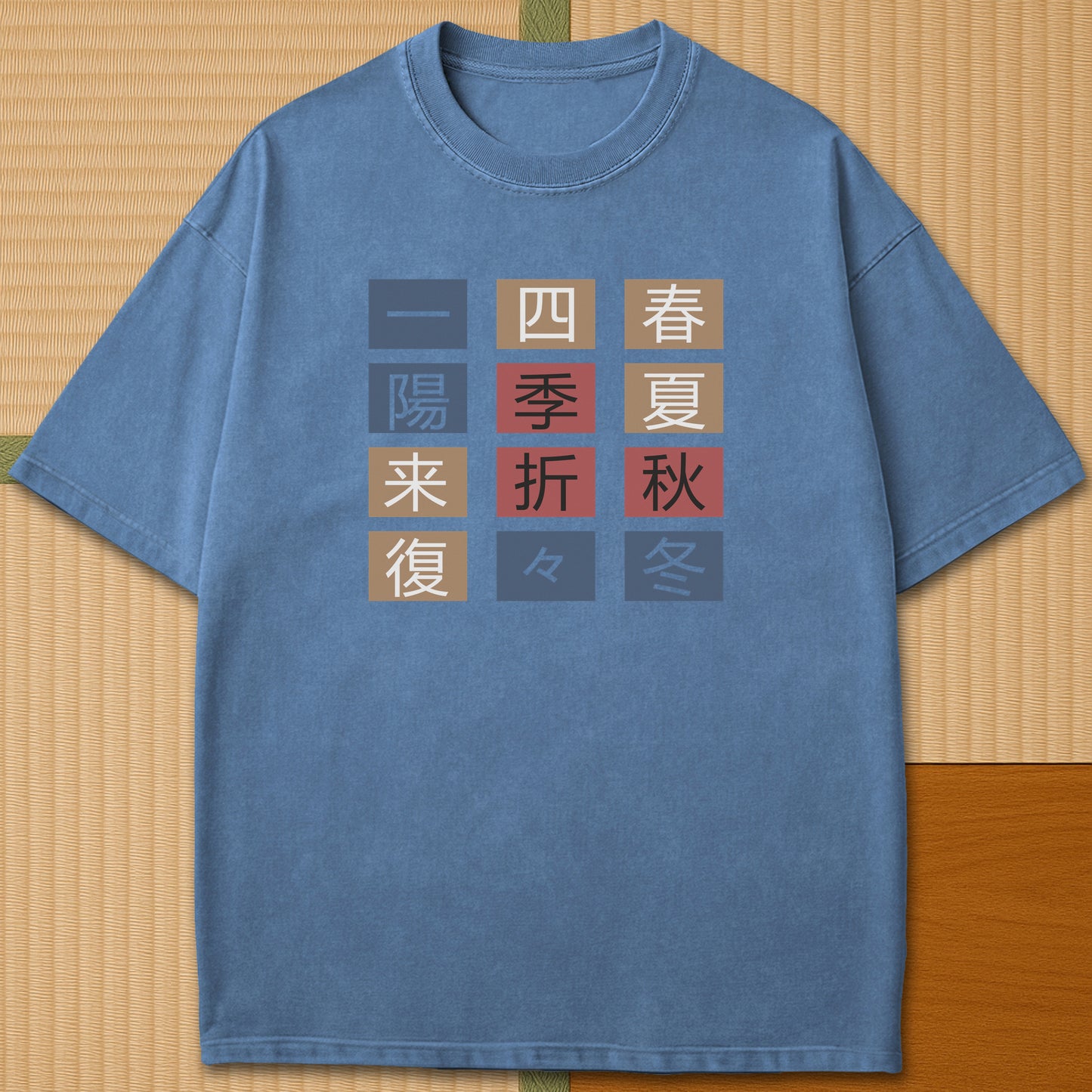 Japanese-inspired cotton The Seasons T-Shirt in Blue Jean on Comfort Colors 1717, styled in a modern flatlay scene.