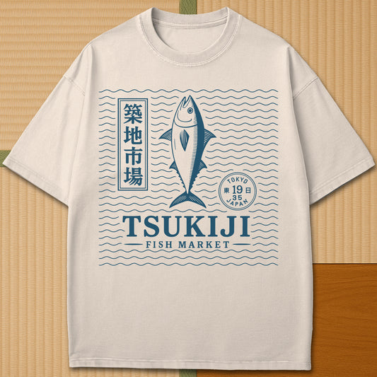 Japanese-inspired cotton Tsukiji Tuna Fish Market T-Shirt in Ivory on Comfort Colors 1717, styled in a modern flatlay scene.