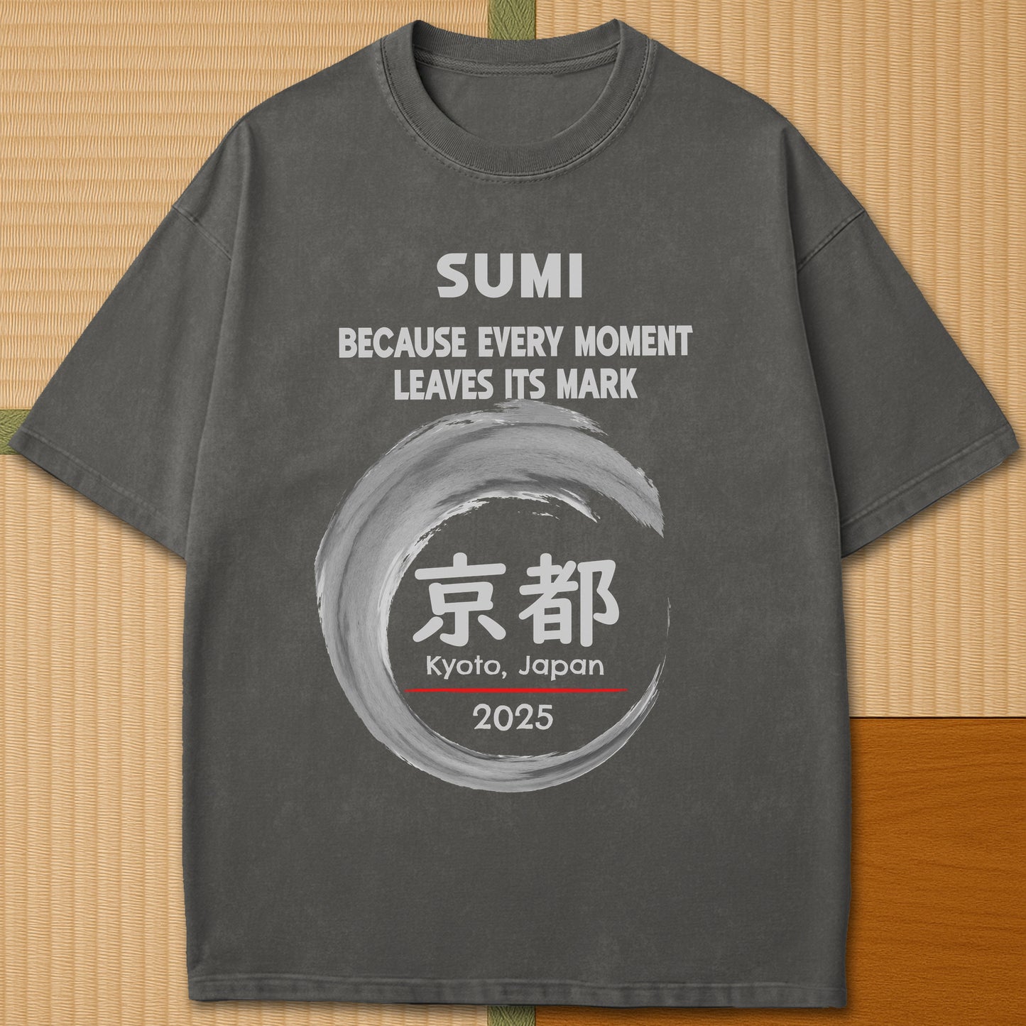 Japanese-inspired cotton Sumi Marks Kyoto T-Shirt in Pepper on Comfort Colors 1717, styled in a modern flatlay scene.