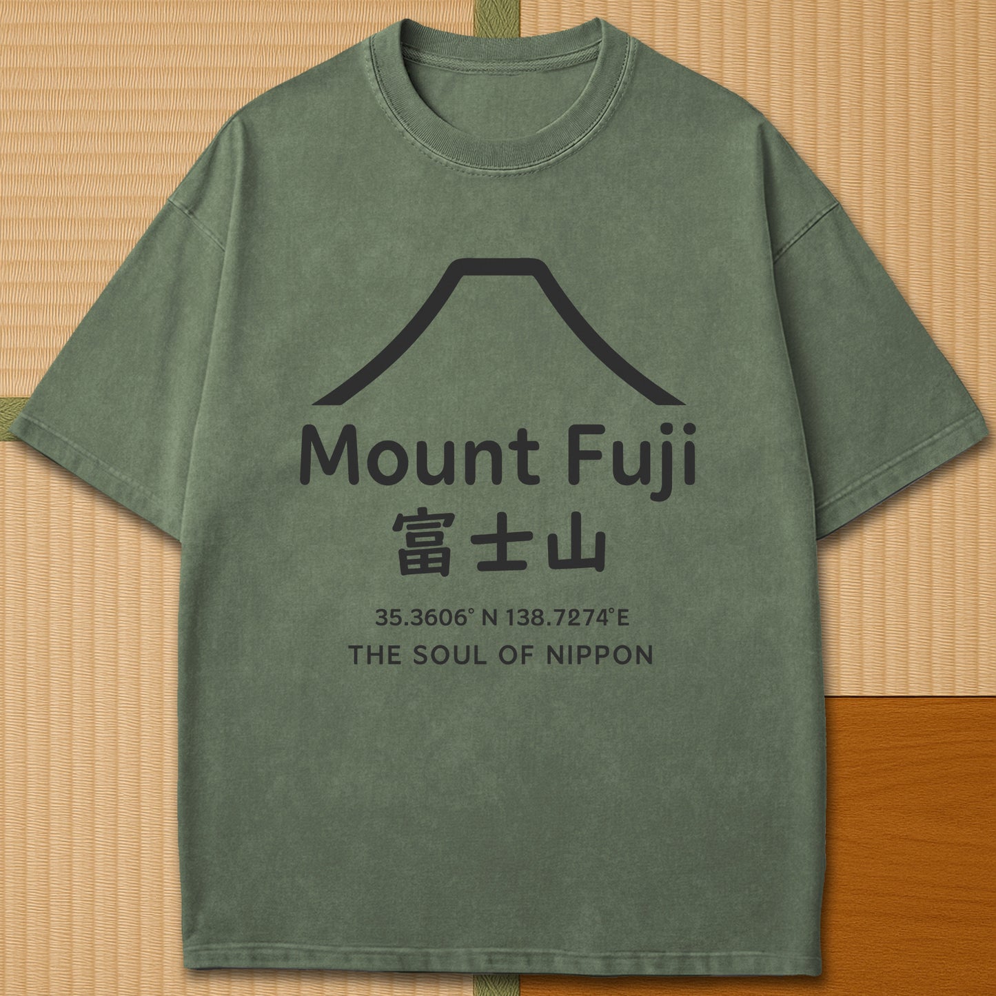 Japanese-inspired cotton Mount Fuji Japan T-Shirt in Moss on Comfort Colors 1717, styled in a modern flatlay scene.