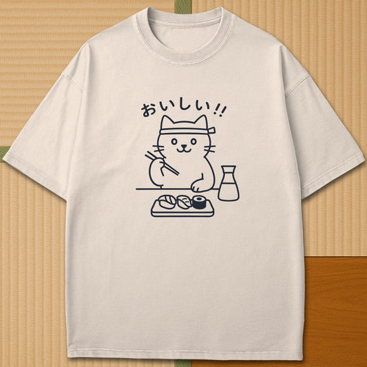 Japanese-inspired cotton Minimalist Cat & Sushi T-Shirt in Ivory on Comfort Colors 1717, styled in a modern flatlay scene.