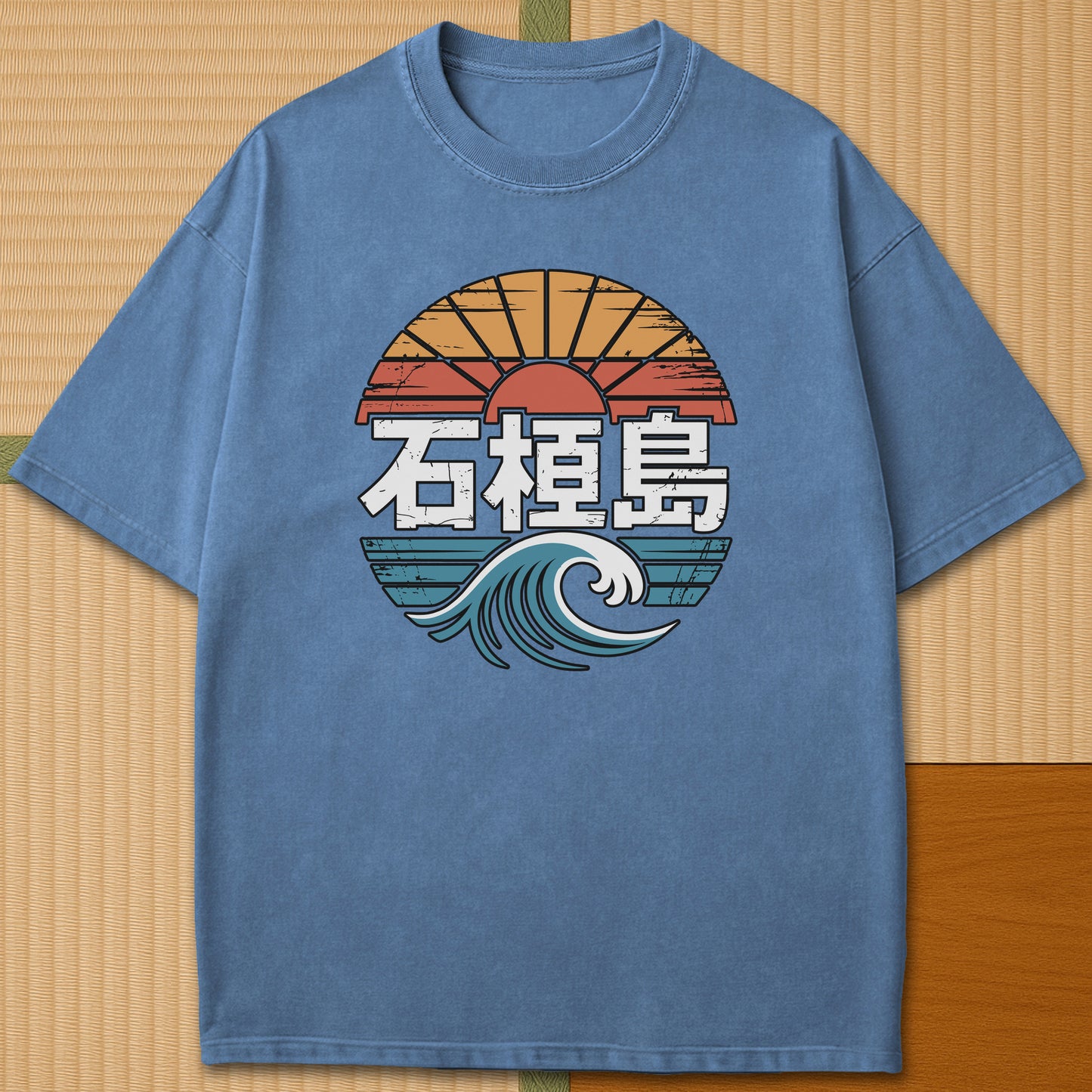 Japanese-inspired cotton Ishigaki Island Vintage Graphic Travel T-Shirt in Blue Jean on Comfort Colors 1717, styled in a modern flatlay scene.