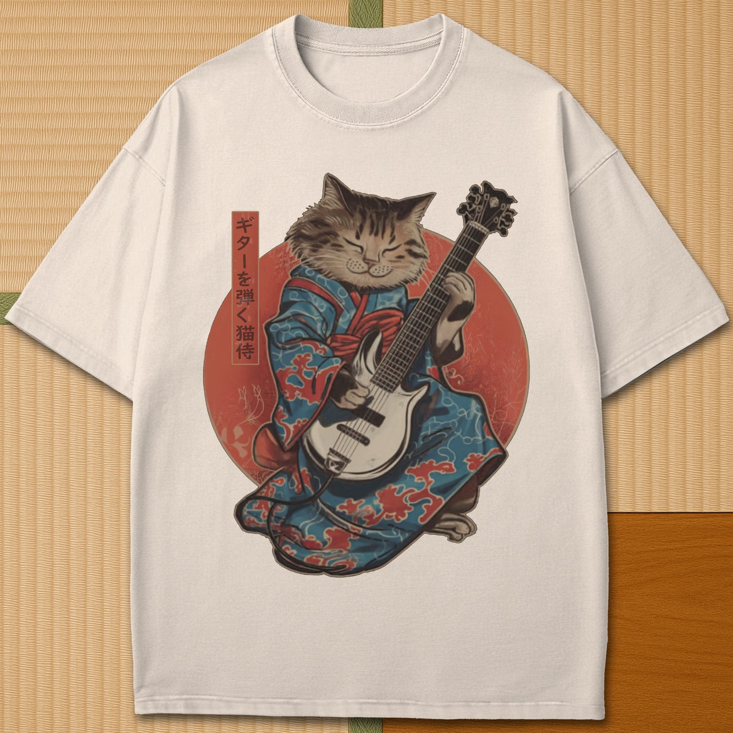 Japanese-inspired cotton Samurai Cat On Guitar T-Shirt in Ivory on Comfort Colors 1717, styled in a modern flatlay scene.