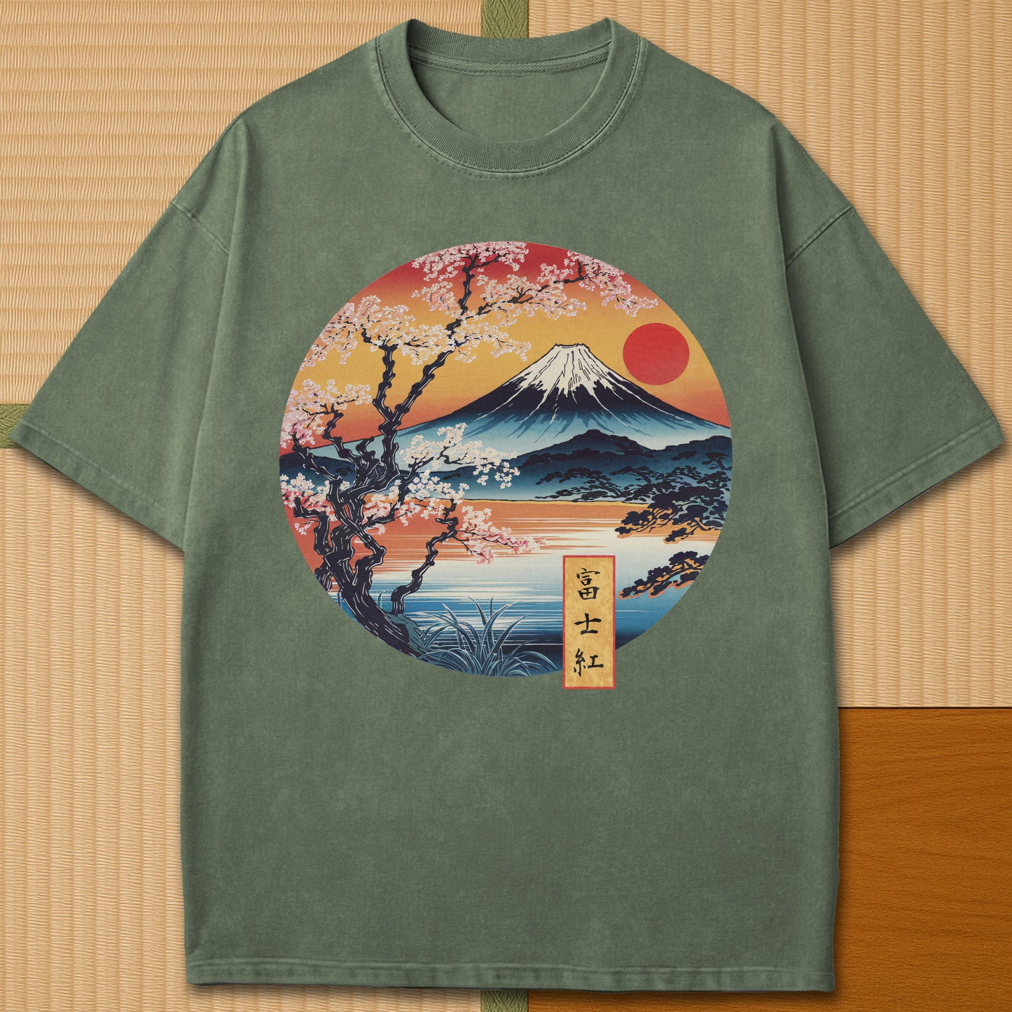 Japanese-inspired cotton Fuji Sunset T-Shirt in Moss on Comfort Colors 1717, styled in a modern flatlay scene.