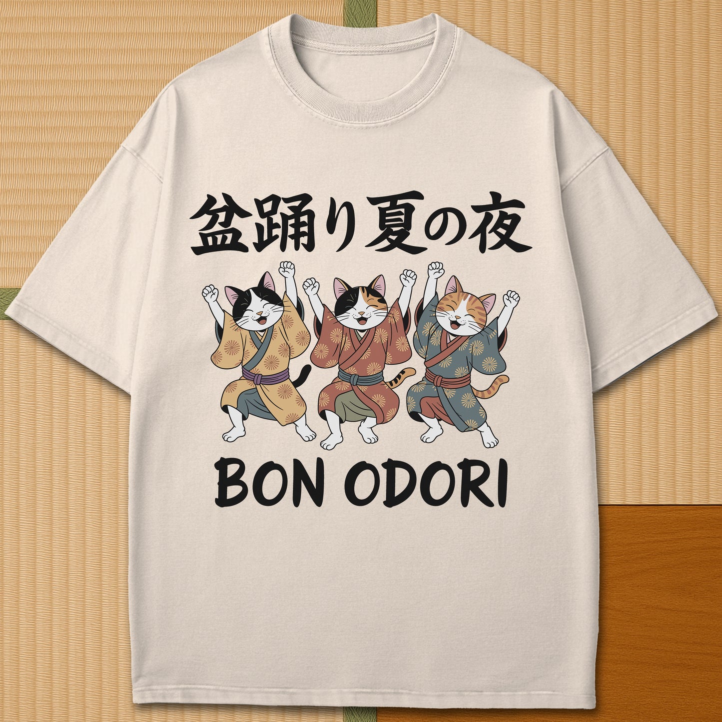 Japanese-inspired cotton Summer Night Bon Odori Cats T-Shirt in Ivory on Comfort Colors 1717, styled in a modern flatlay scene.
