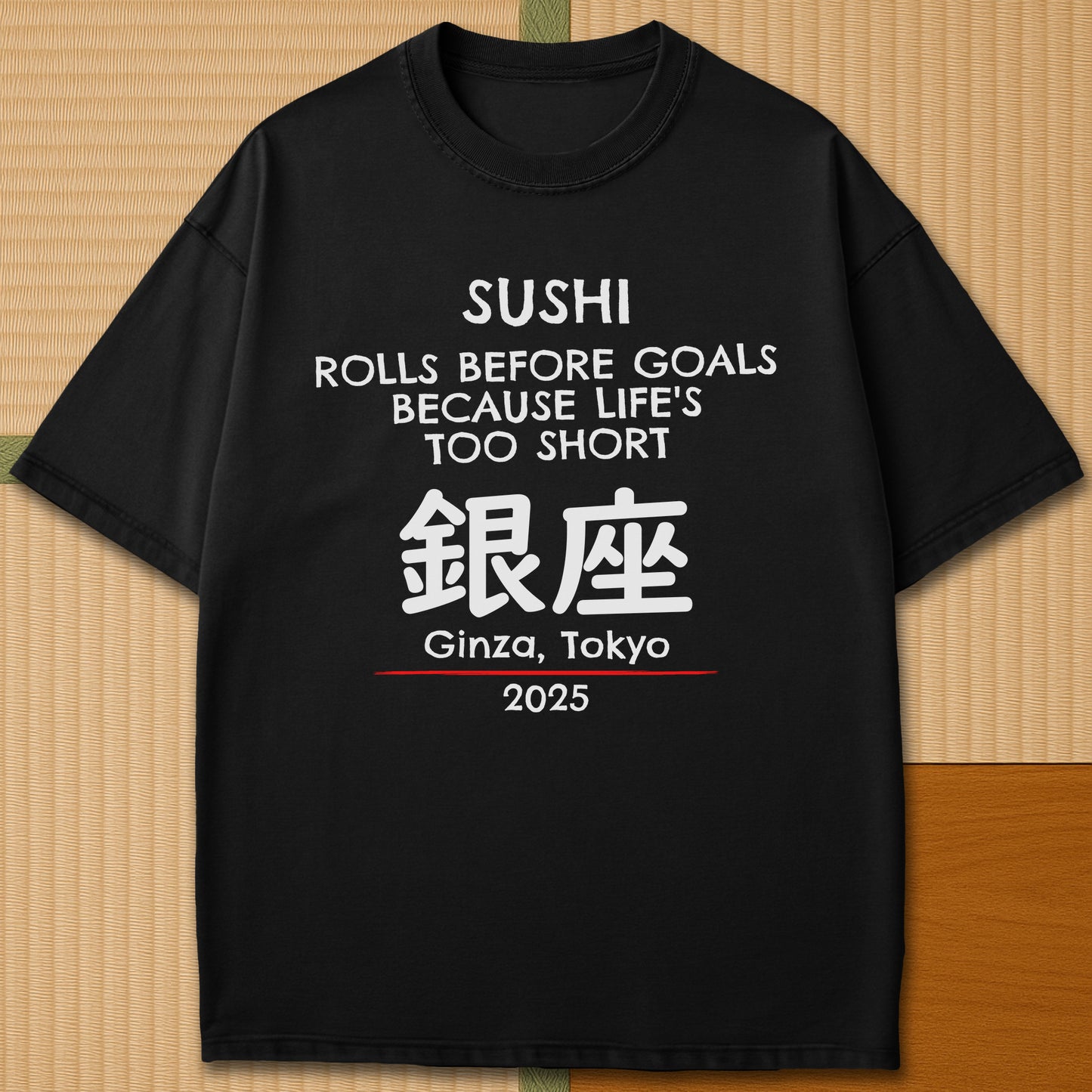 Japanese-inspired cotton Sushi Rolls Before Goals T-Shirt in Black on Comfort Colors 1717, styled in a modern flatlay scene.