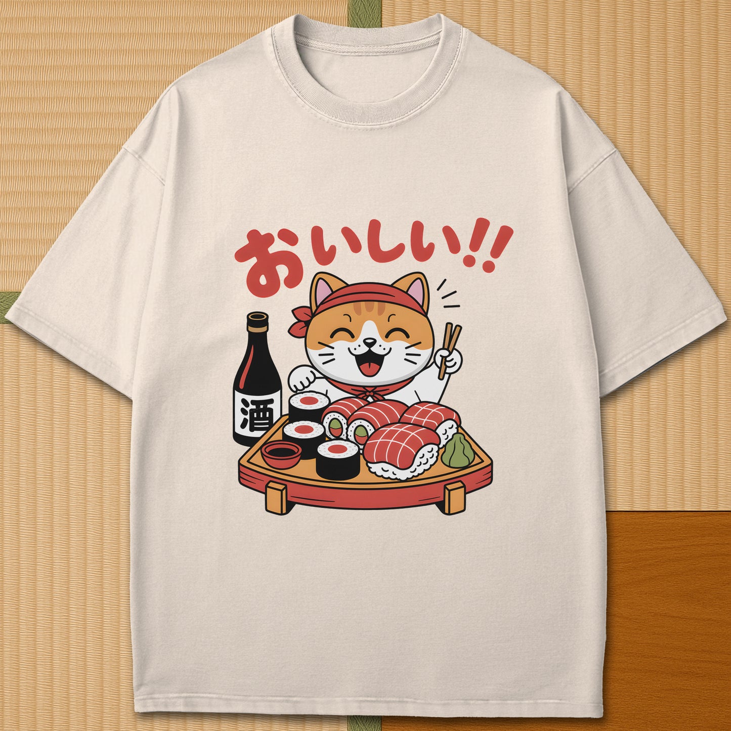 Japanese-inspired cotton Cute Cat And Sushi T-Shirt in Ivory on Comfort Colors 1717, styled in a modern flatlay scene.