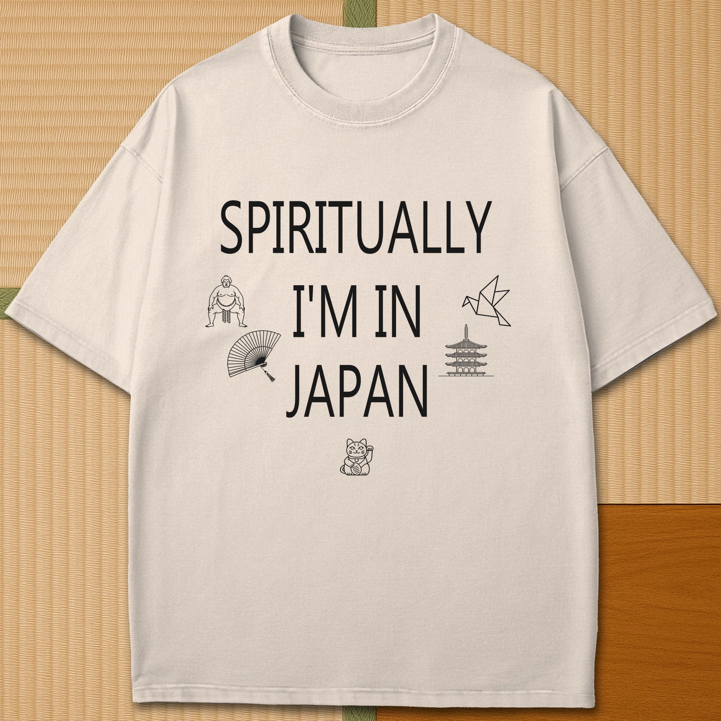 Japanese-inspired cotton Spiritually In Japan T-Shirt in Ivory on Comfort Colors 1717, styled in a modern flatlay scene.