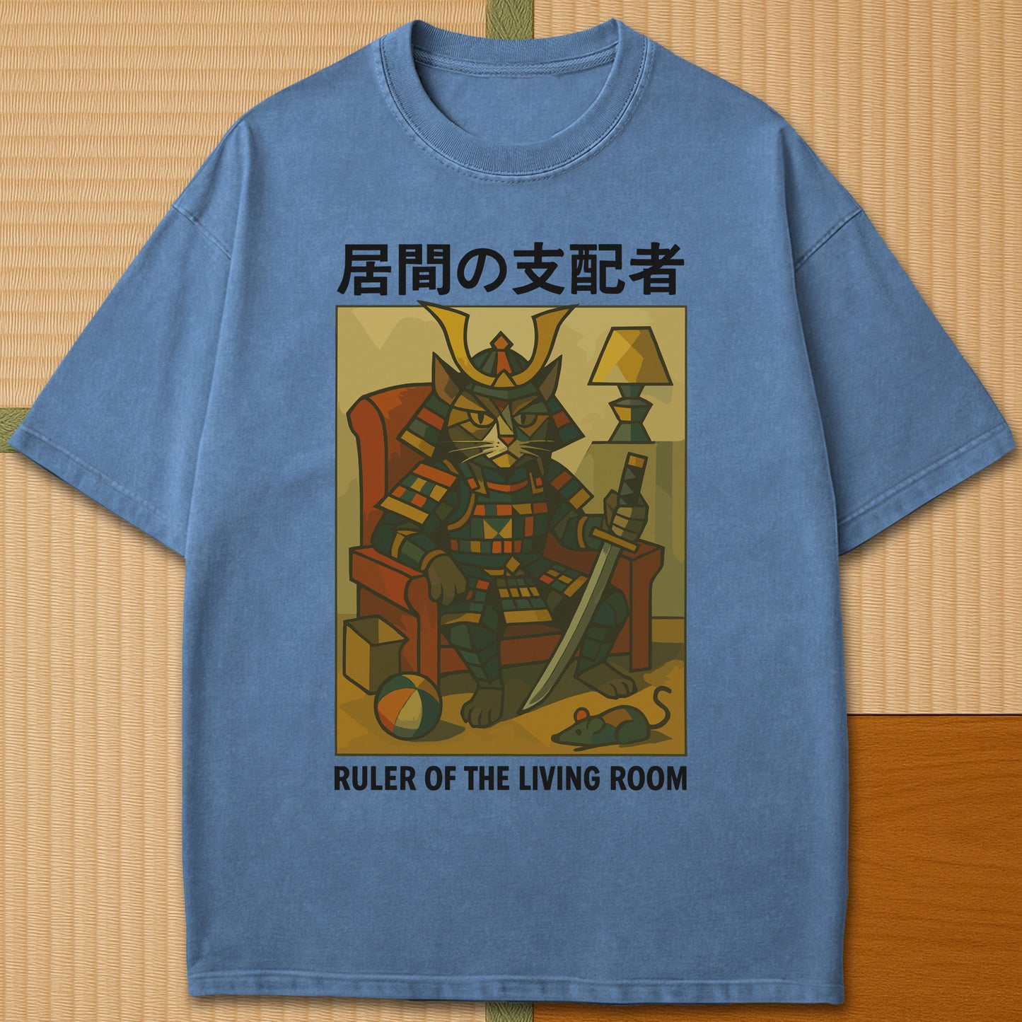 Japanese-inspired cotton Ruler Of The Living Room Shogun Cat T-Shirt in Blue Jean on Comfort Colors 1717, styled in a modern flatlay scene.