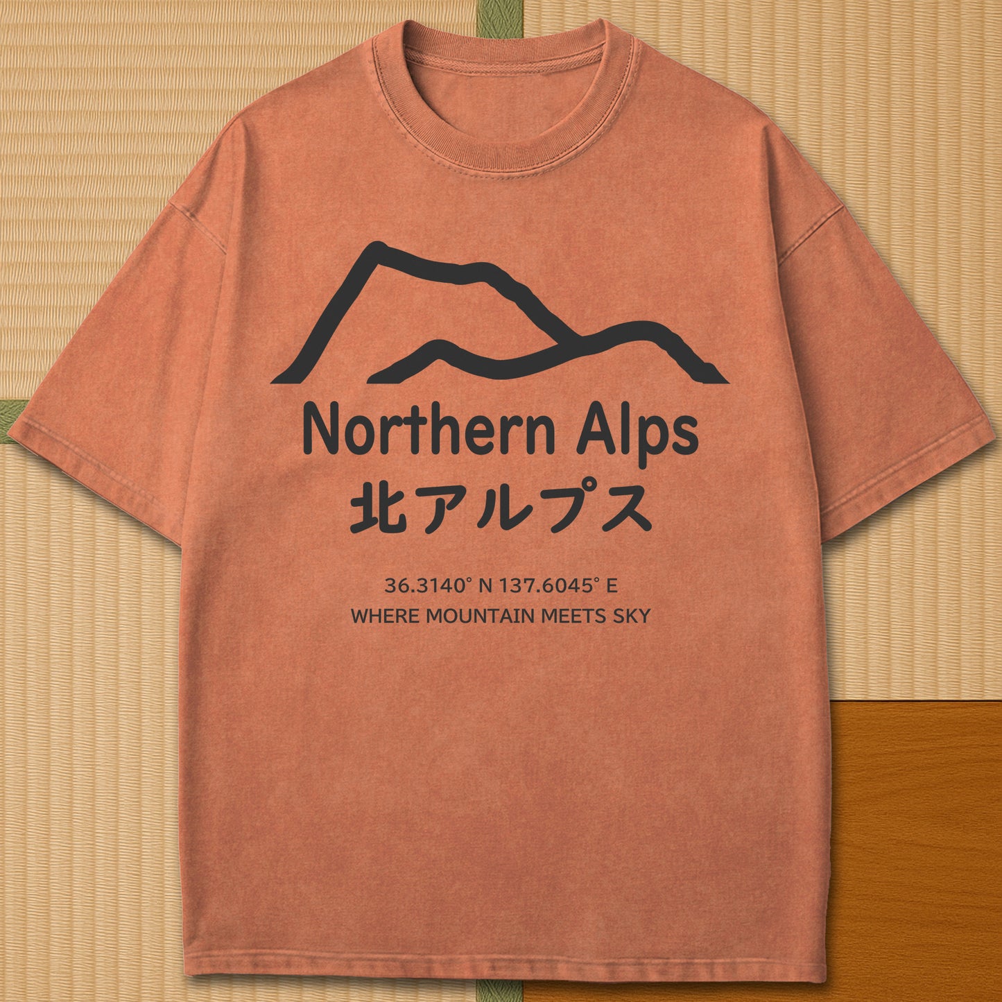 Japanese-inspired cotton Northern Alps Japan T-Shirt in Yam on Comfort Colors 1717, styled in a modern flatlay scene.