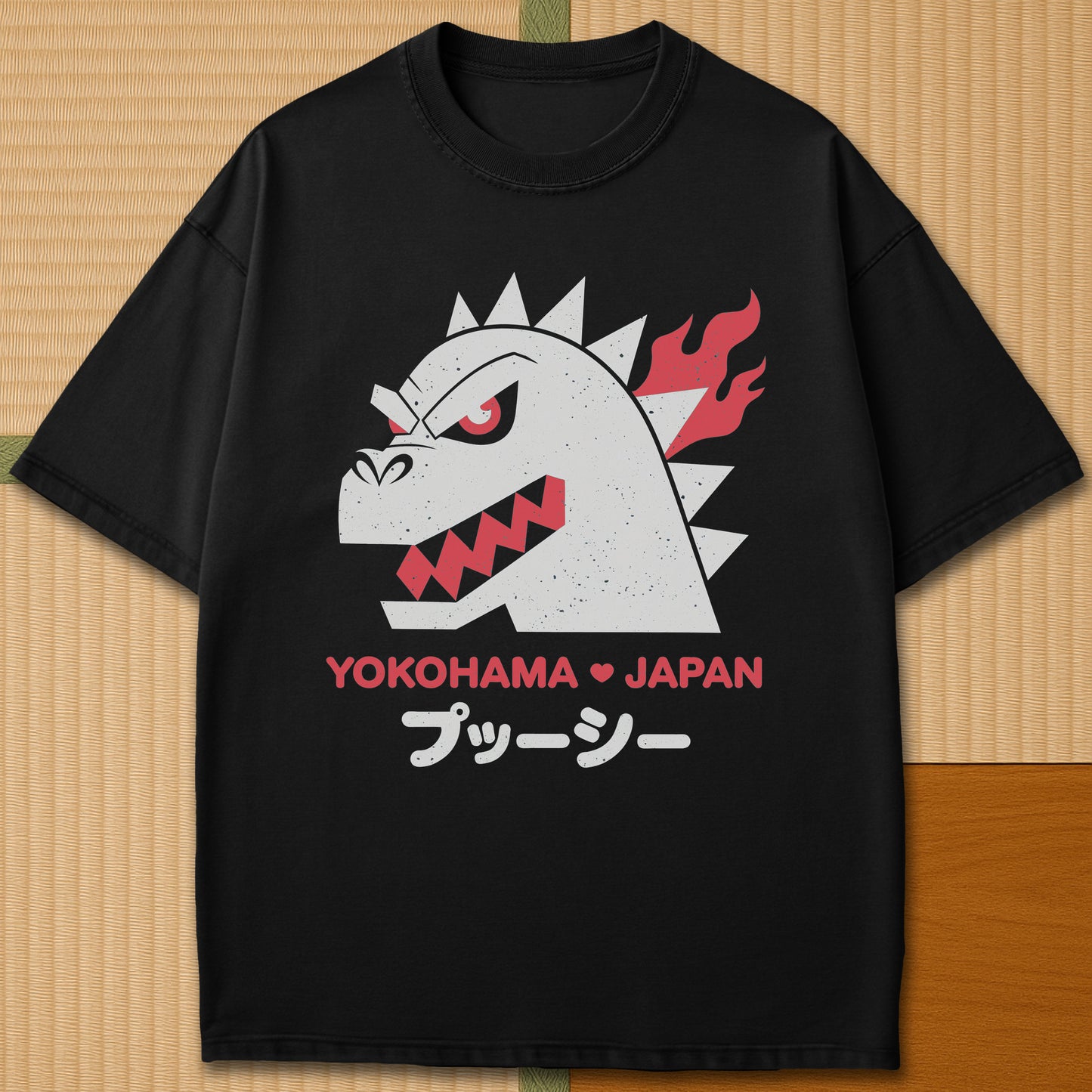 Japanese-inspired cotton Vintage Kaiju Godzilla T-Shirt in Black on Comfort Colors 1717, styled in a modern flatlay scene.