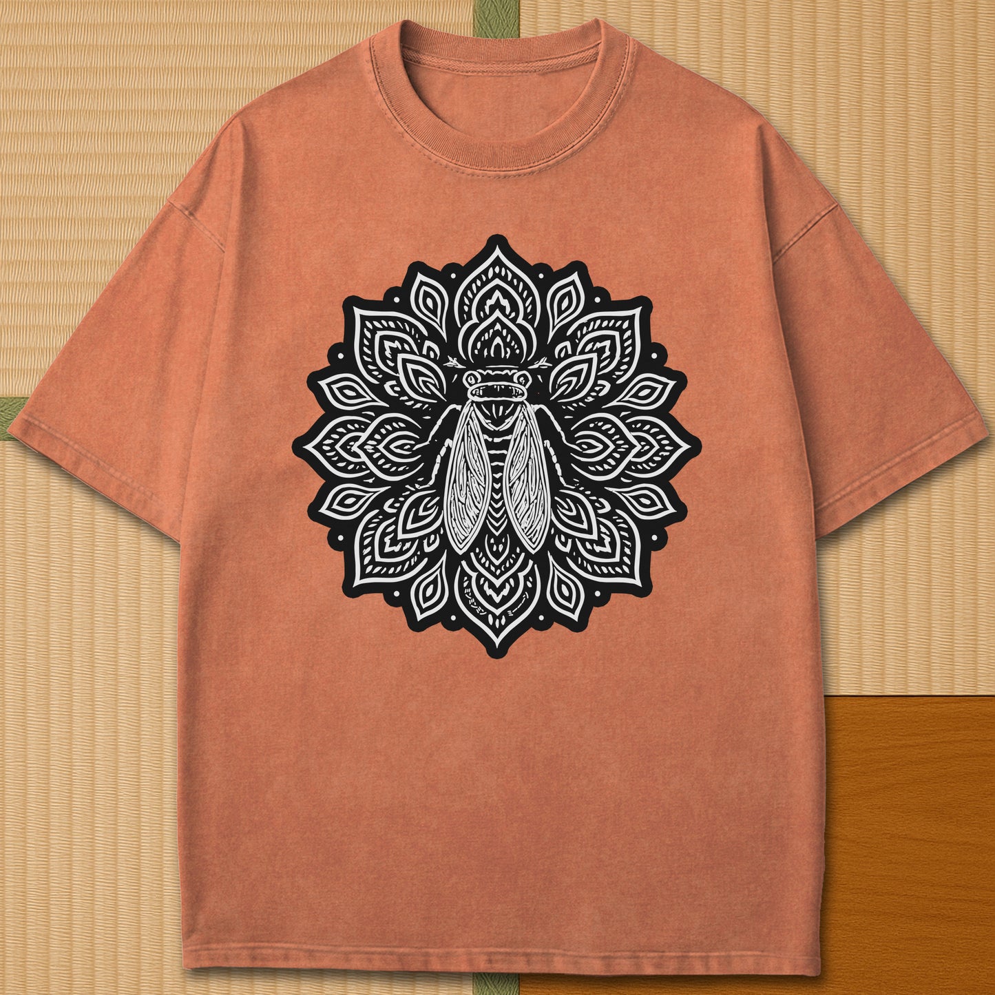 Japanese-inspired cotton Cicada Mandala T-Shirt in Yam on Comfort Colors 1717, styled in a modern flatlay scene.